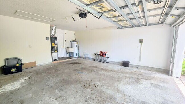 Building Photo - Spacious 4BR w/ Fenced Yard + Covered Lanai + 2 Car Garage  in Orange Park!