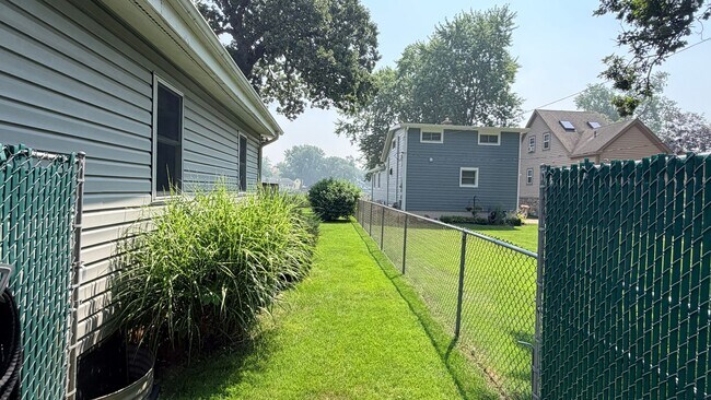 Building Photo - Riverfront Living on the Fox: 2 Bed, 1 Bath with Private Dock and Oversized Garage