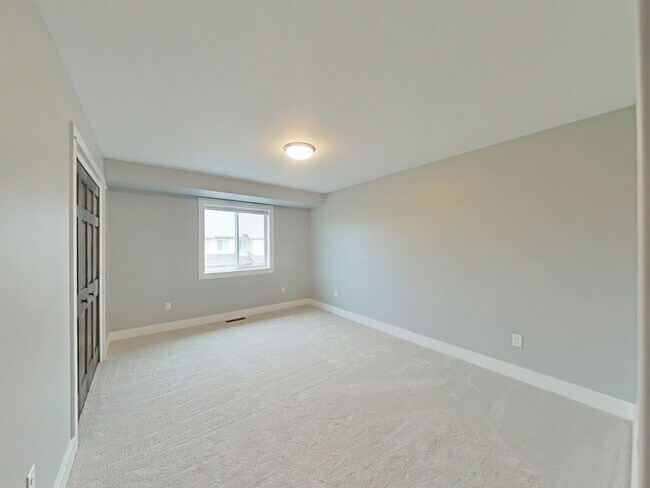 Building Photo - Stunning 3-bedroom, 2.5-bathroom condo with attached 2 stall garage!
