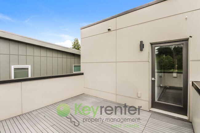 Building Photo - Modern 3 Bedroom with Rooftop Deck and In Unit Laundry