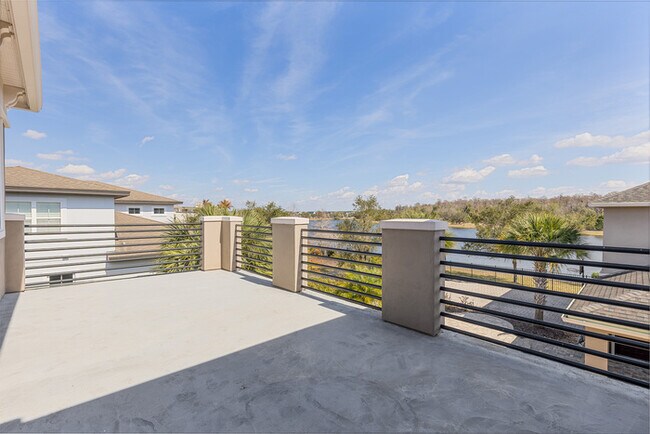 Building Photo - Luxury Waterfront Pool Home in Laureate Park | 4BR + Water Views