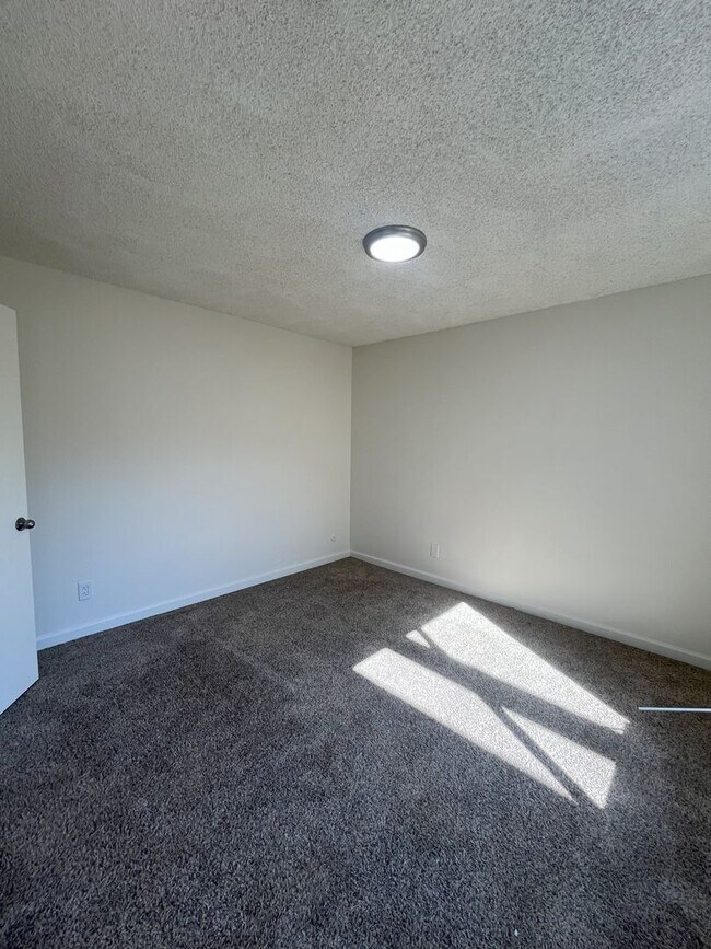 Building Photo - Upstairs unit Available Soon!