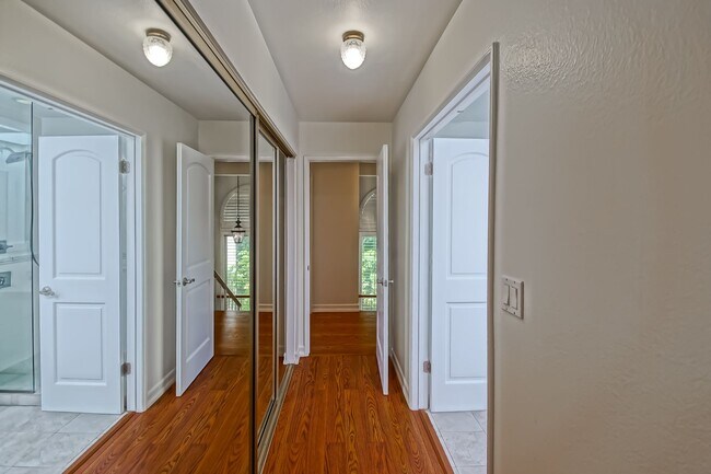 Building Photo - BRIGHT & AIRY, REAR-UNIT TOWNHOUSE W/ SPACIOUS PATIO, BALCONY & HUGE 2-CAR GARAGE IN GATED COMMUN...