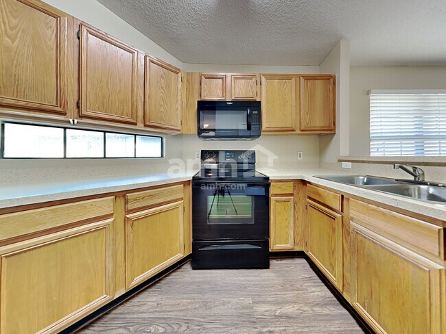 Building Photo - 7602 Putters Cove Dr