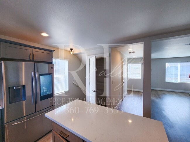 Building Photo - Modern, Spacious, & Conveniently Located H...