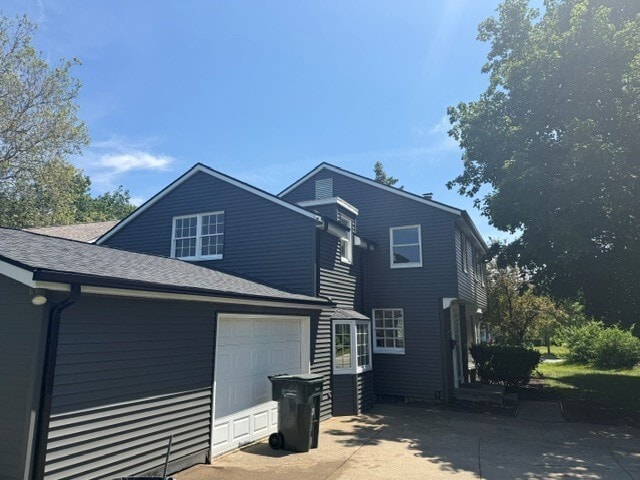 Siding Upgrade in progress - 716 S Twyckenham Dr