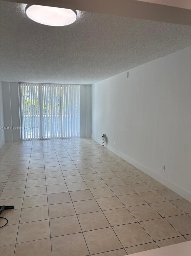 Building Photo - 19390 Collins Ave