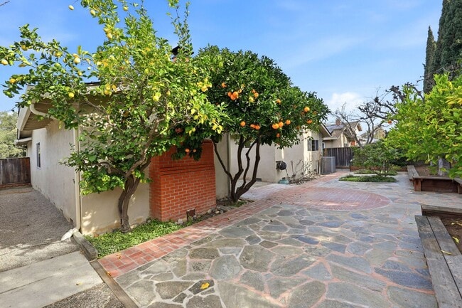 Building Photo - Beautifully Updated 3BR/2BA Home with Private Garden Oasis