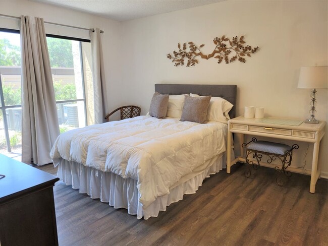 Building Photo - Bird Bay Village Annual Rental – Furnished 1st Floor Unit with Covered Parking