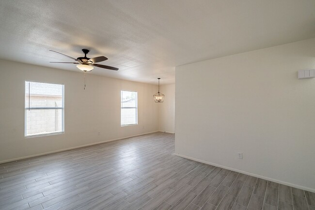 Building Photo - Updated home with large backyard & 2 car g...