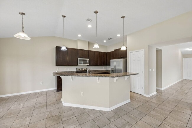 Building Photo - Elegant 4BR Home with Gourmet Kitchen, Smart Tech Package & Nature Views - Coming Soon