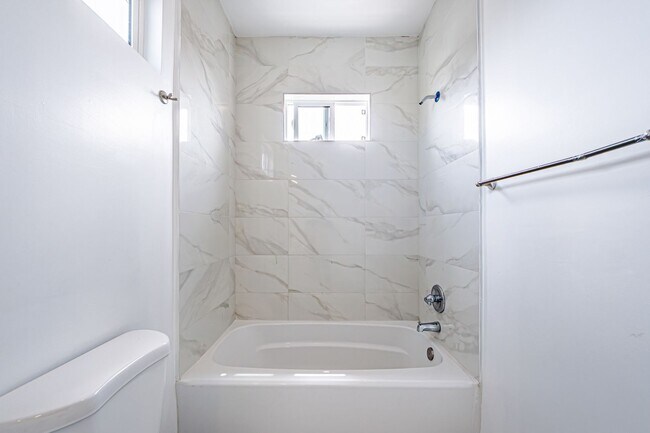 Building Photo - Spacious 4-Bedroom, 3-Bath Home – Modern Upgrades & Parking Included