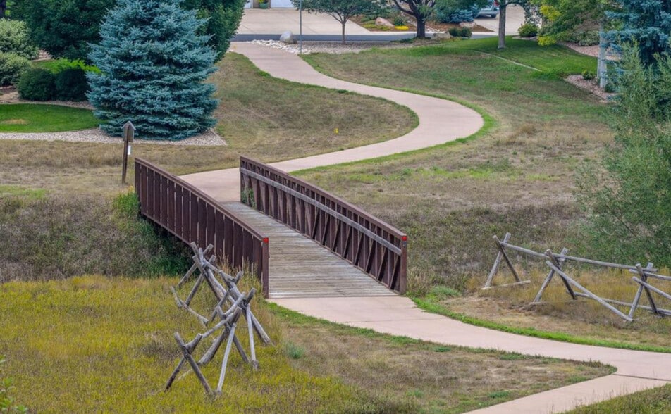 Bridge towards the neighborhood - 5620 Fossil Creek Pky