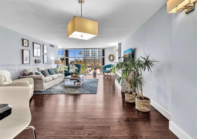 Building Photo - 6423 Collins Ave