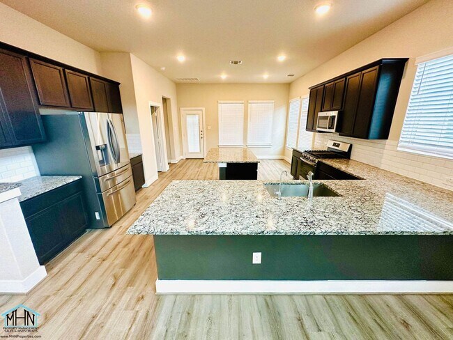 Building Photo - Welcome Home to Modern Elegance in Copper ...