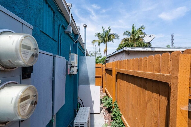 Building Photo - Fully Furnished Long Beach Retreat with Private Spa & Outdoor Entertaining Area