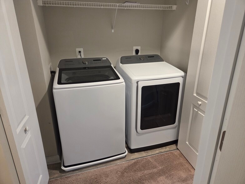 Upstairs laundry closet - 128 Loblolly Dr