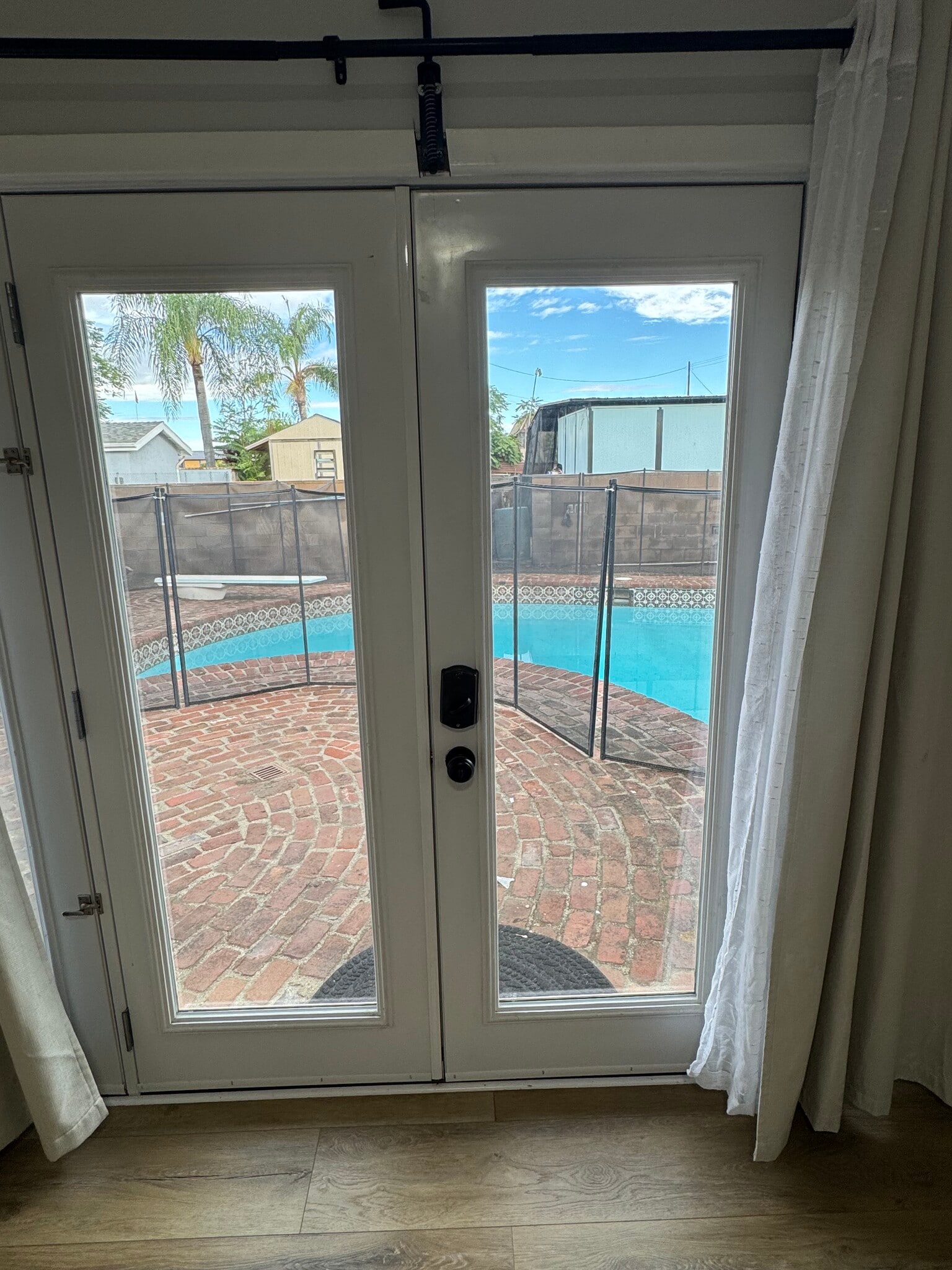 French doors out to pool from bedroom #3 - 11305 Sheldon St