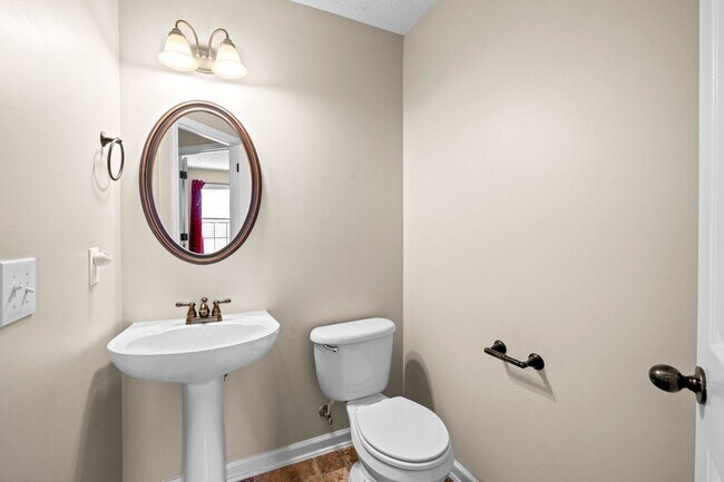 Building Photo - Pet Friendly Three Bedroom with Bonus!