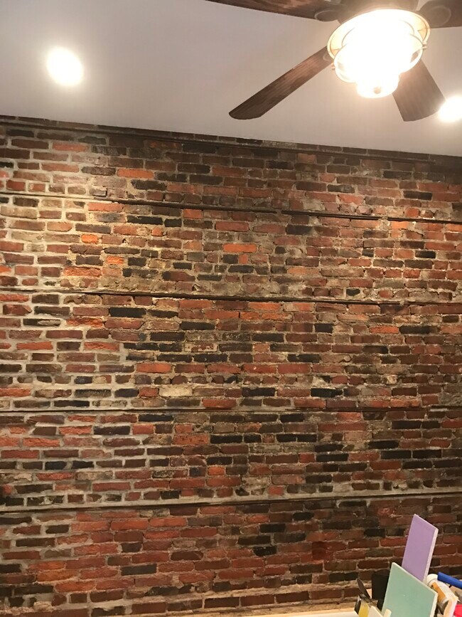 Exposed Brick in Living Room - 1302 Rodman St