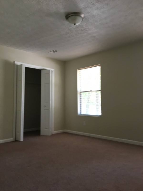 Building Photo - Beautiful 4BR/2BA home nestled in a quiet Ellenwood GA