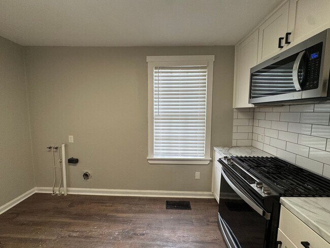 Building Photo - McQueen Street 4-plex - SMITK-LILY