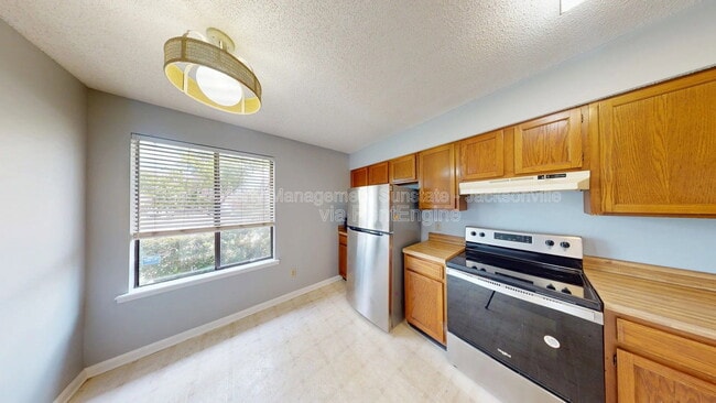 Building Photo - 11256 Windtree Dr E