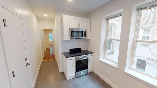 Building Photo - 9/1 No Fee! Renovated, spacious 2BR w/balcony near B/C/D trains