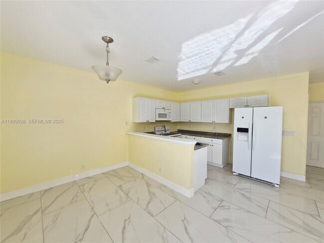 Building Photo - 1209 NW 27th Ave