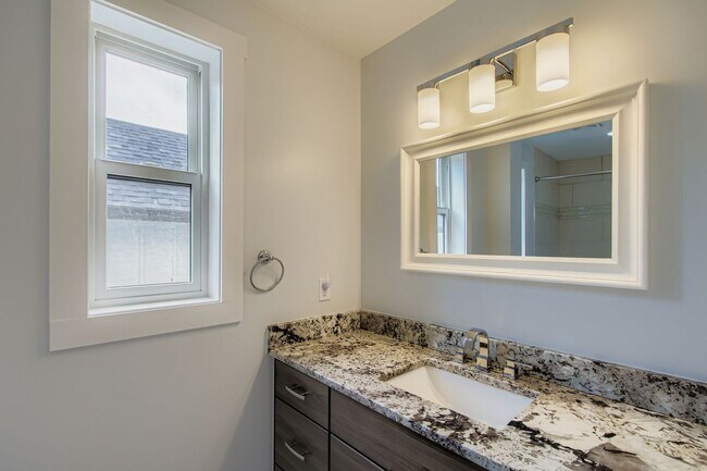 Building Photo - Edge Water Beauty- This is a Must See Home!