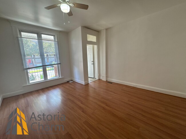 Building Photo - Comfortable 3-Bedroom with Hardwood Floors...