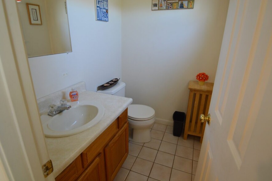 half bath on second floor near dining room - 202 Fairway Dr