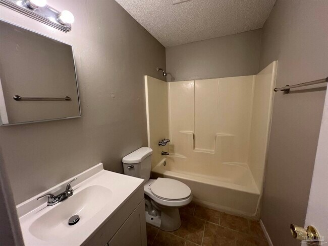 Building Photo - 6809 Tiki Ln