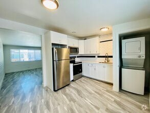 Building Photo - Modern living in this completely updated 2...