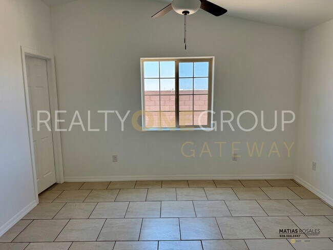 Building Photo - Three Bedroom Two Bath Home with All Tile ...