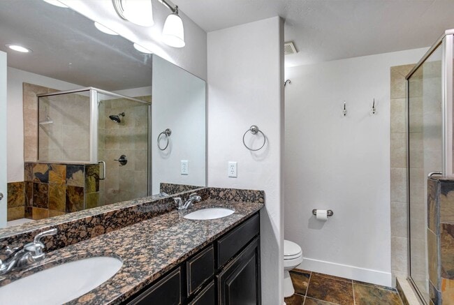 Building Photo - Unfurnished Condo Retreat with Modern Comf...