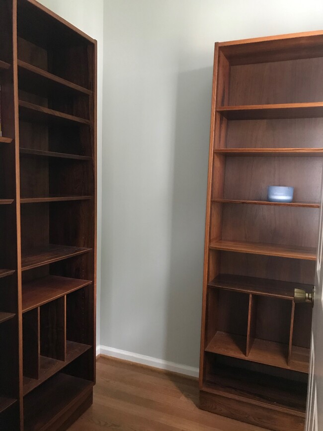 Walk-in closet with windows upstairs. Can also be used as small home office. - 107 Swanton Hill Ct