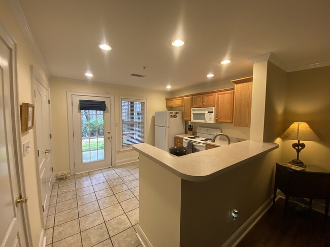 Bar area into kitchen - 600 Mitchell Bridge Rd