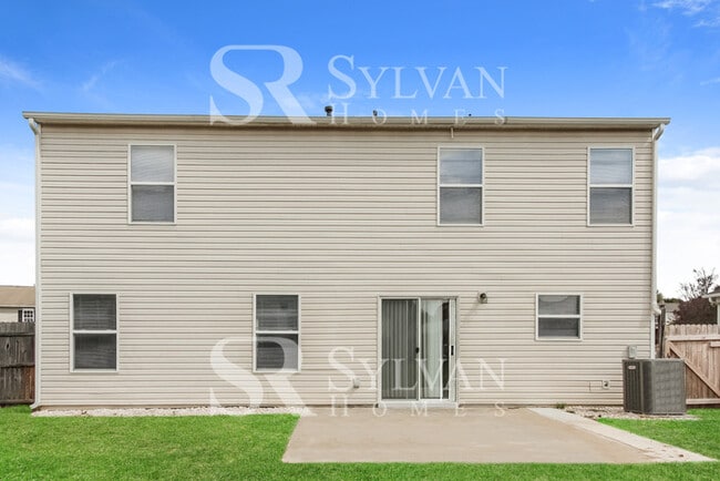Building Photo - Enjoy living the good life in this 4 bedro...