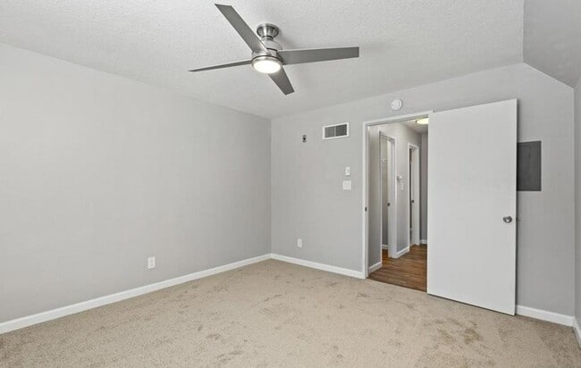 Building Photo - Remodeled Upper-Level 1BR Condo with Balcony & Garage Parking in Verano Community