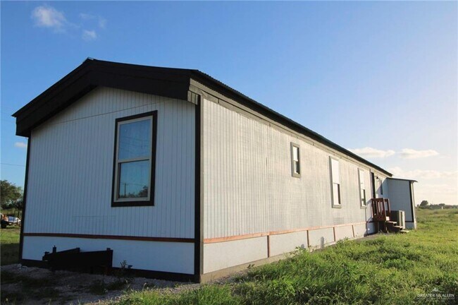 Building Photo - 19 Mile 11 N Rd