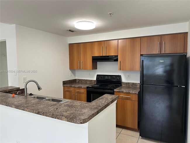 Building Photo - 5840 W Sample Rd