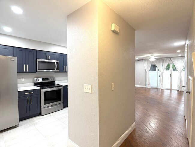 Building Photo - Water and Lawn Care Included! Beautiful Corner-Lot Duplex Condo in a Resort-Style Golf Community!