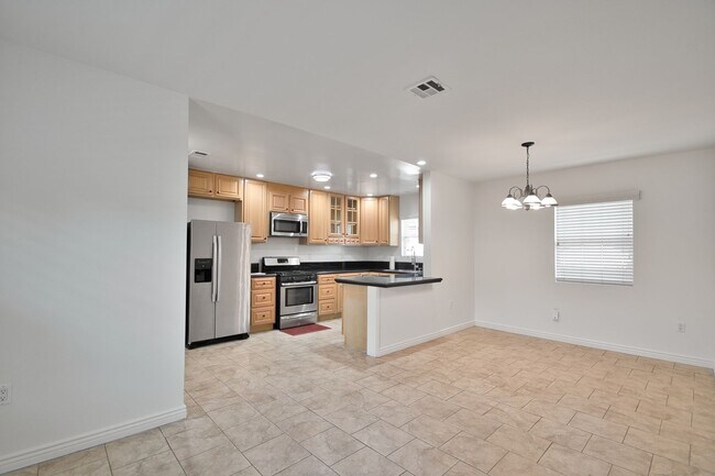 Building Photo - Spacious 4 Bedroom Home with A/C