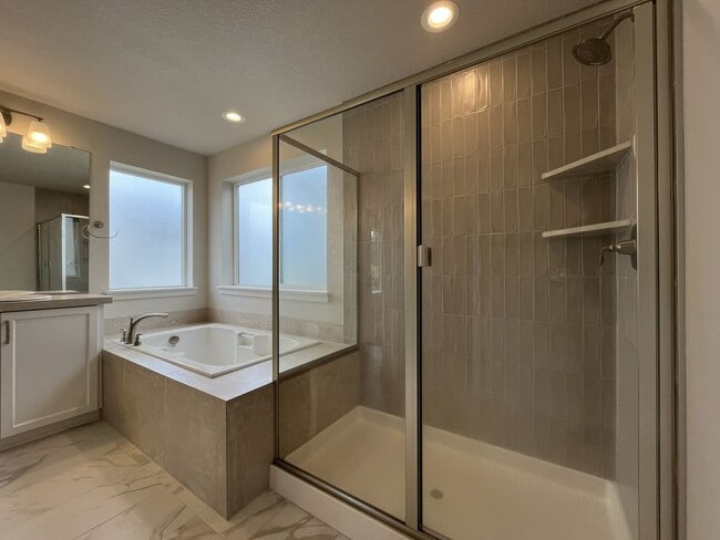 Building Photo - Stunning 2024 Built 5BR Home with Main-Level Suite, EV Charger & Covered Patio Near River Terrace
