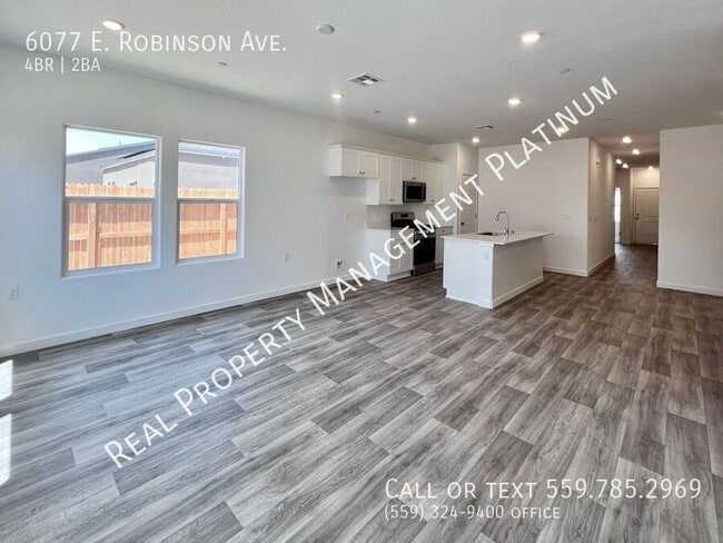 Building Photo - 6077 E Robinson Ave