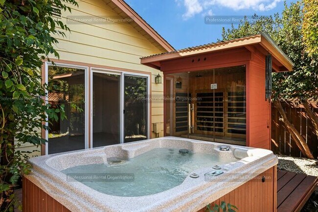 Building Photo - Look No Further, this home has it all- Hot Tub, Sauna, EV Charger, Solar, KOI Pond & More