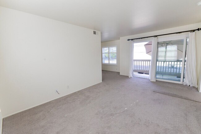 Building Photo - Sunny 2BR/2BA Coastal Retreat — Steps from the Sand with Ocean Breezes