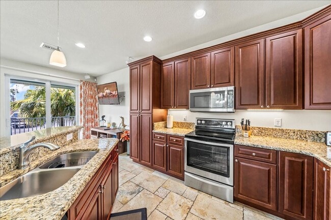 Building Photo - Coastal Living with Marina Views in Cape Crossing