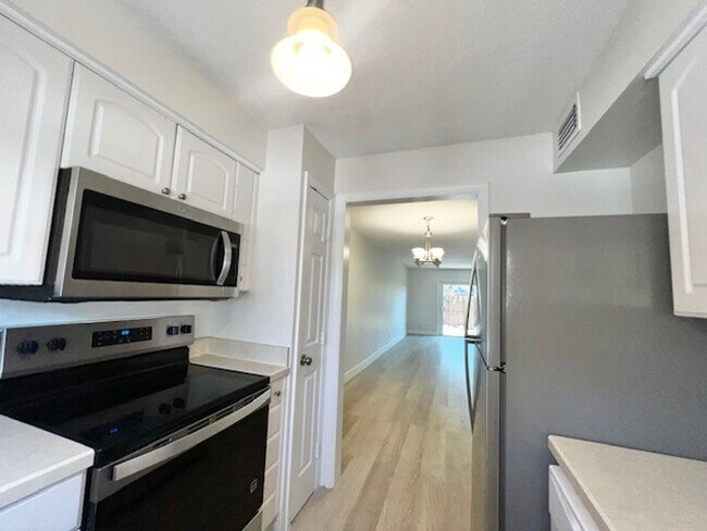 Building Photo - 2X2.5 -MOVE IN NOW! NEW LVP FLOORING ON 1ST FLOOR! NEW CARPET ON 2ND FLOOR! WATER VIEWS! CALL TOD...